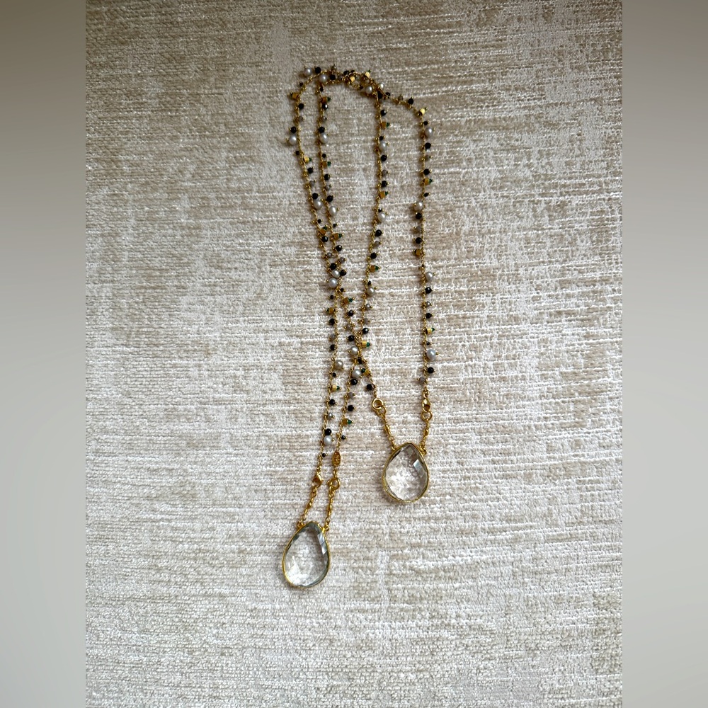 Has Bijoux Elegant Gold and Silver Pendant Necklace. 18” long.